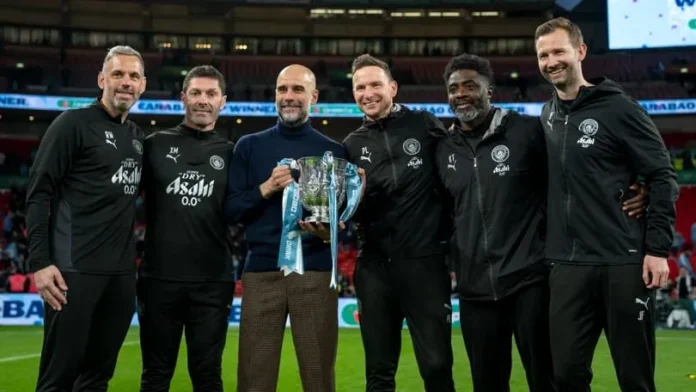 Pep Guardiola mencatatkan rekor sebagai pelatih dengan gelar Piala Liga terbanyak usai membawa Manchester City menjuarai Carabao Cup 2026 di Wembley Stadium (1)